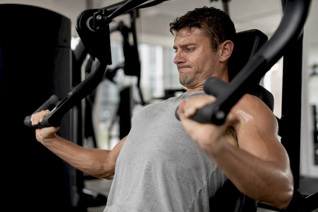 Athlete doing bench press repetition