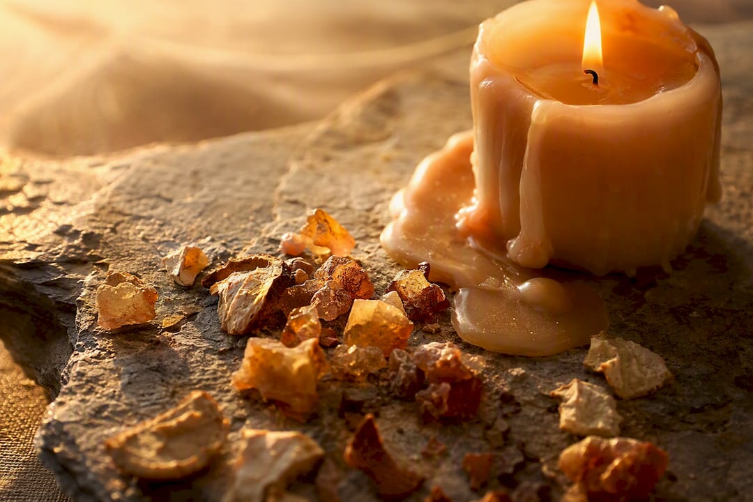Candle wax pool with resin base notes