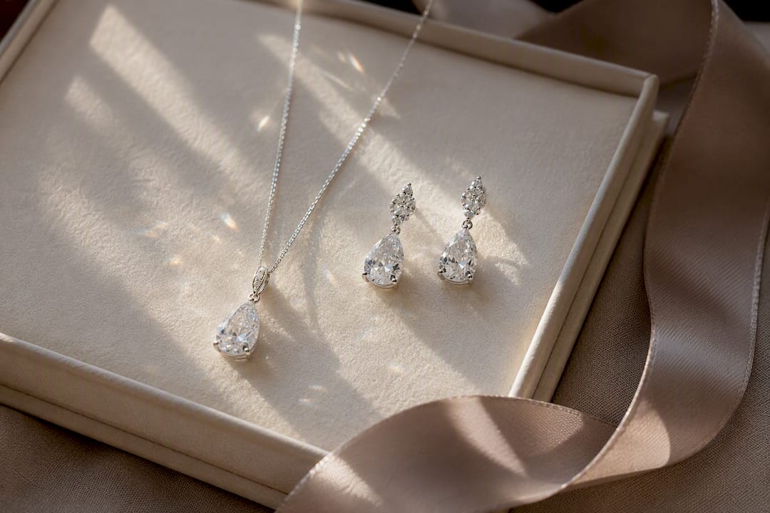Crystal drop necklace and earrings on velvet tray