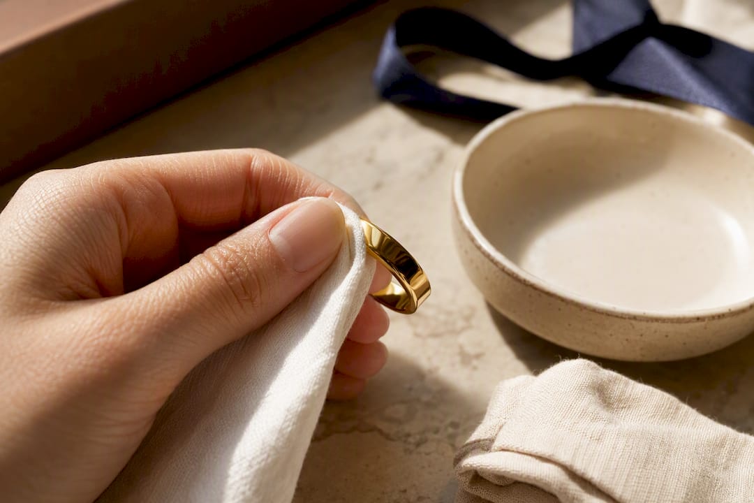 Hand polishing an anonymous gold jewelry band