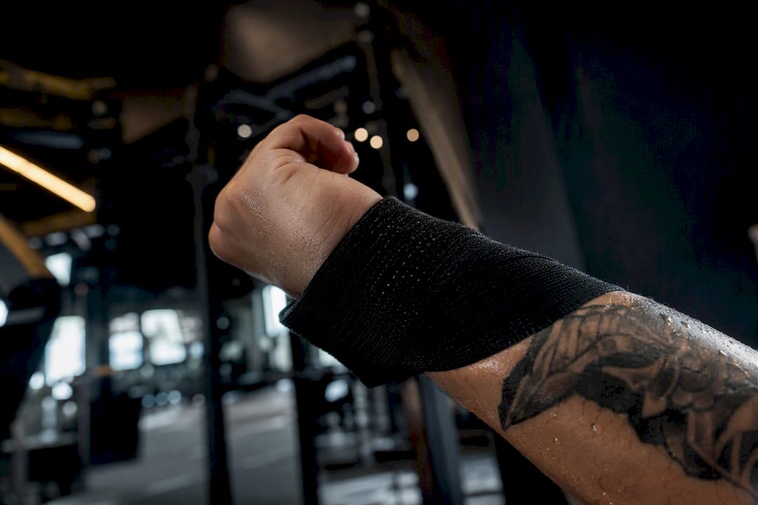 Tattooed wrist sweating during gym workout