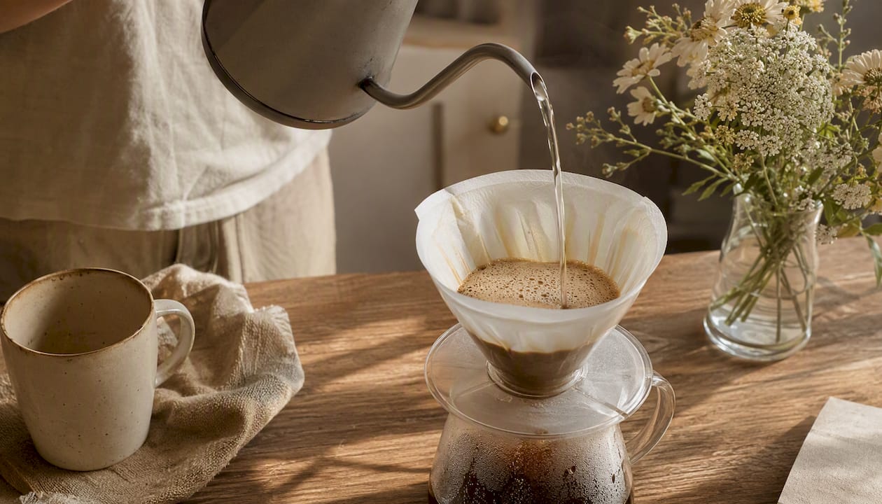 Pour-over brewing bright floral light roast coffee