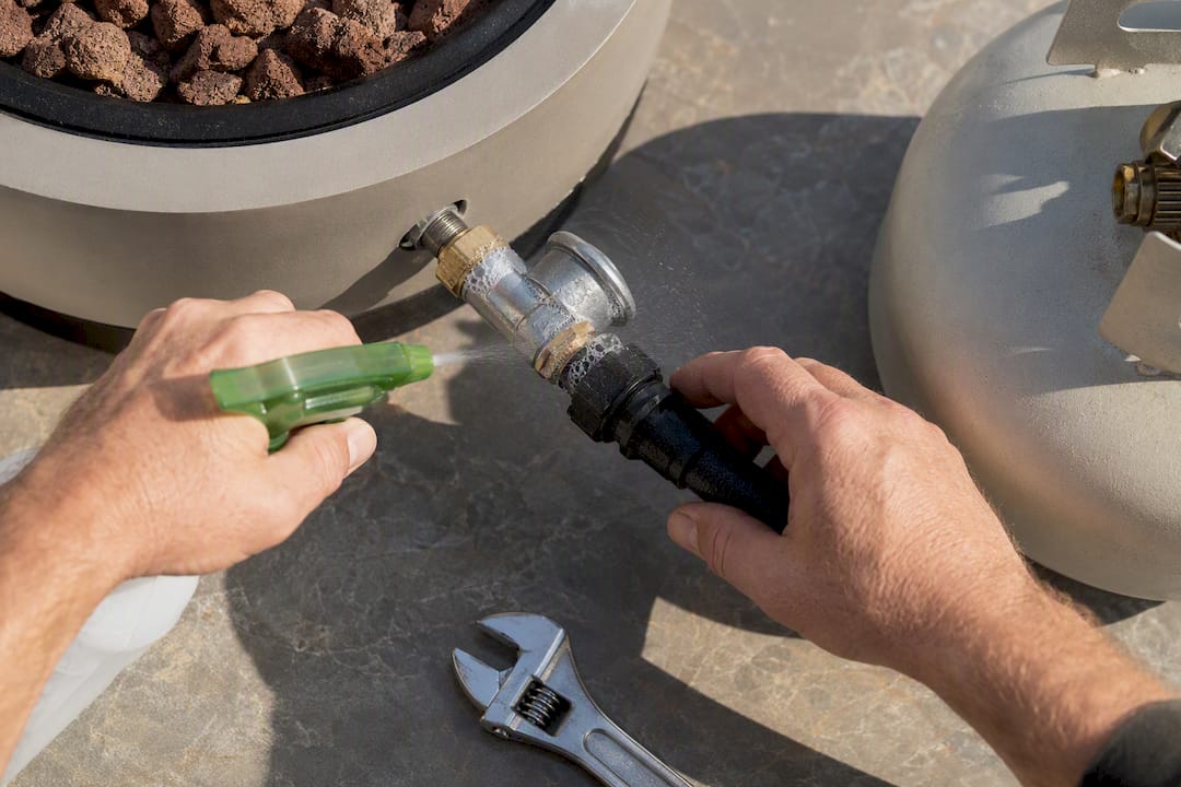 Soap bubbles reveal a propane connection leak