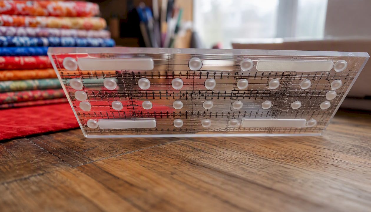 Close-up of quilting ruler underside with grip dots