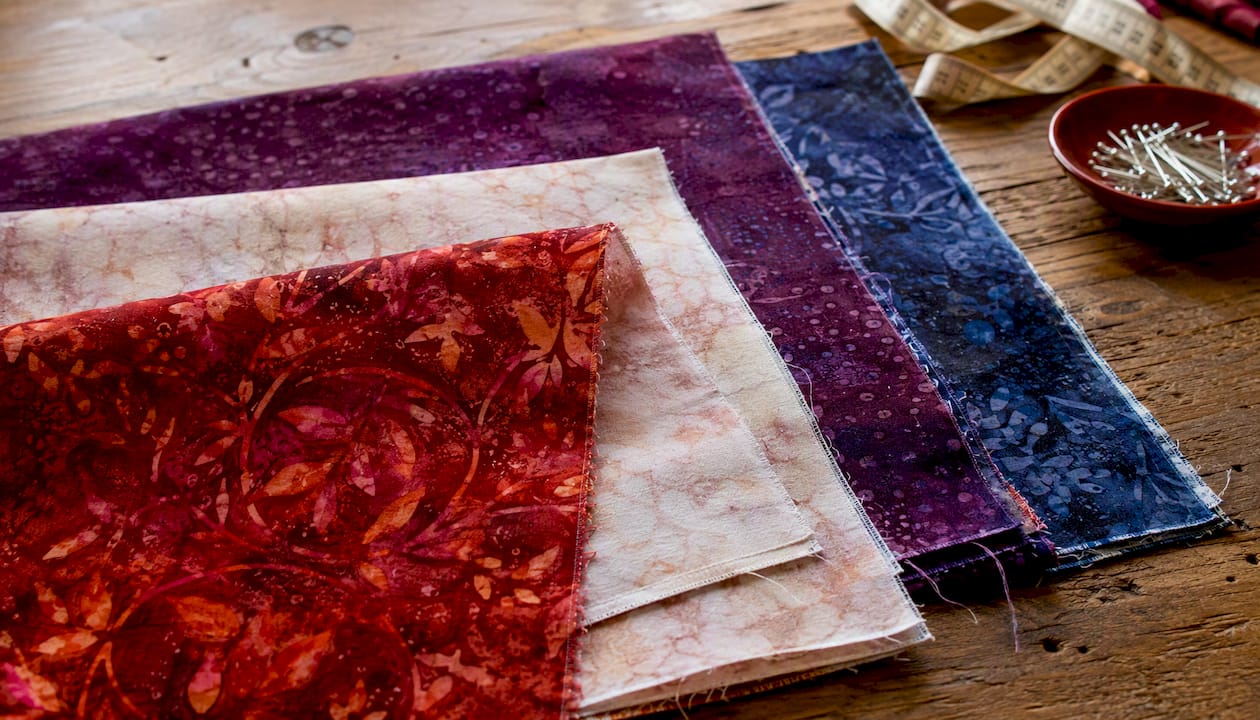 Cut edges of batik quilting cotton showing tight weave