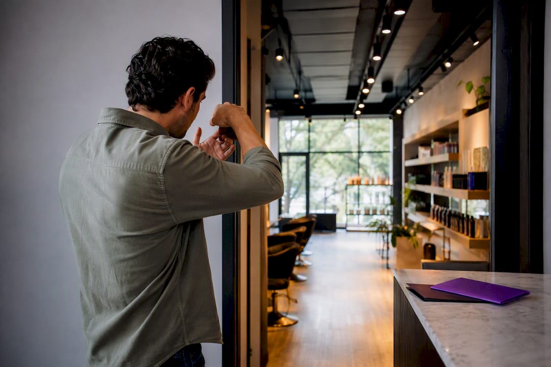 Owner photographing a business interior