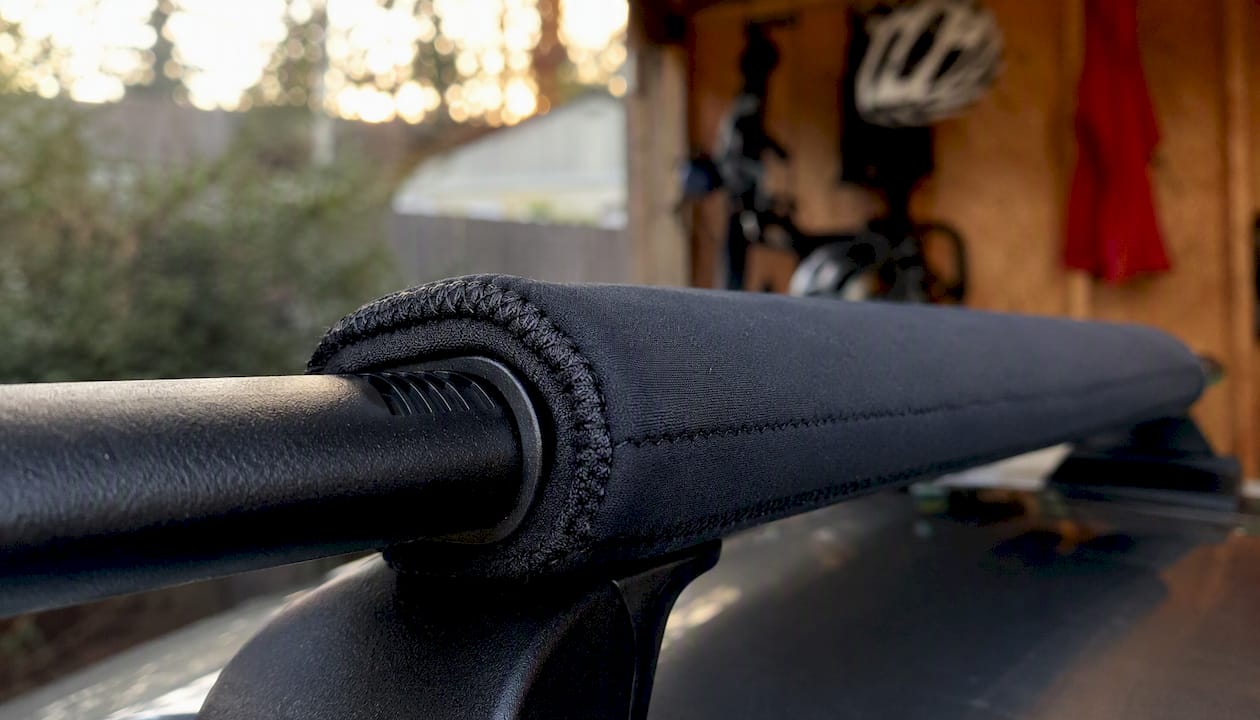 Close-up of neoprene and rubber wraps on roof rack bar