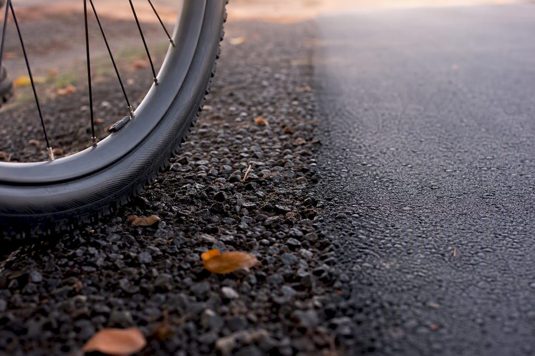 Tubeless tire on chip-seal and polished asphalt roads