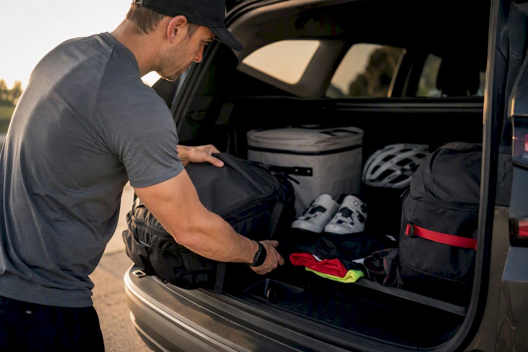 Race trip luggage filling vehicle cargo area