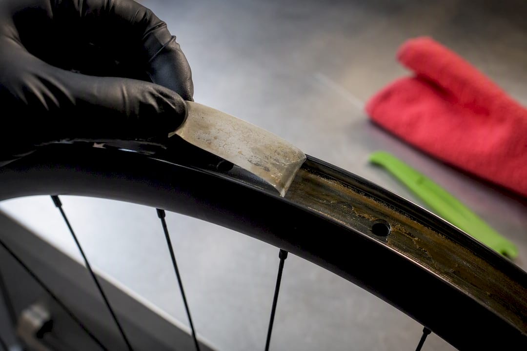 Old tubeless tape residue on rim bed
