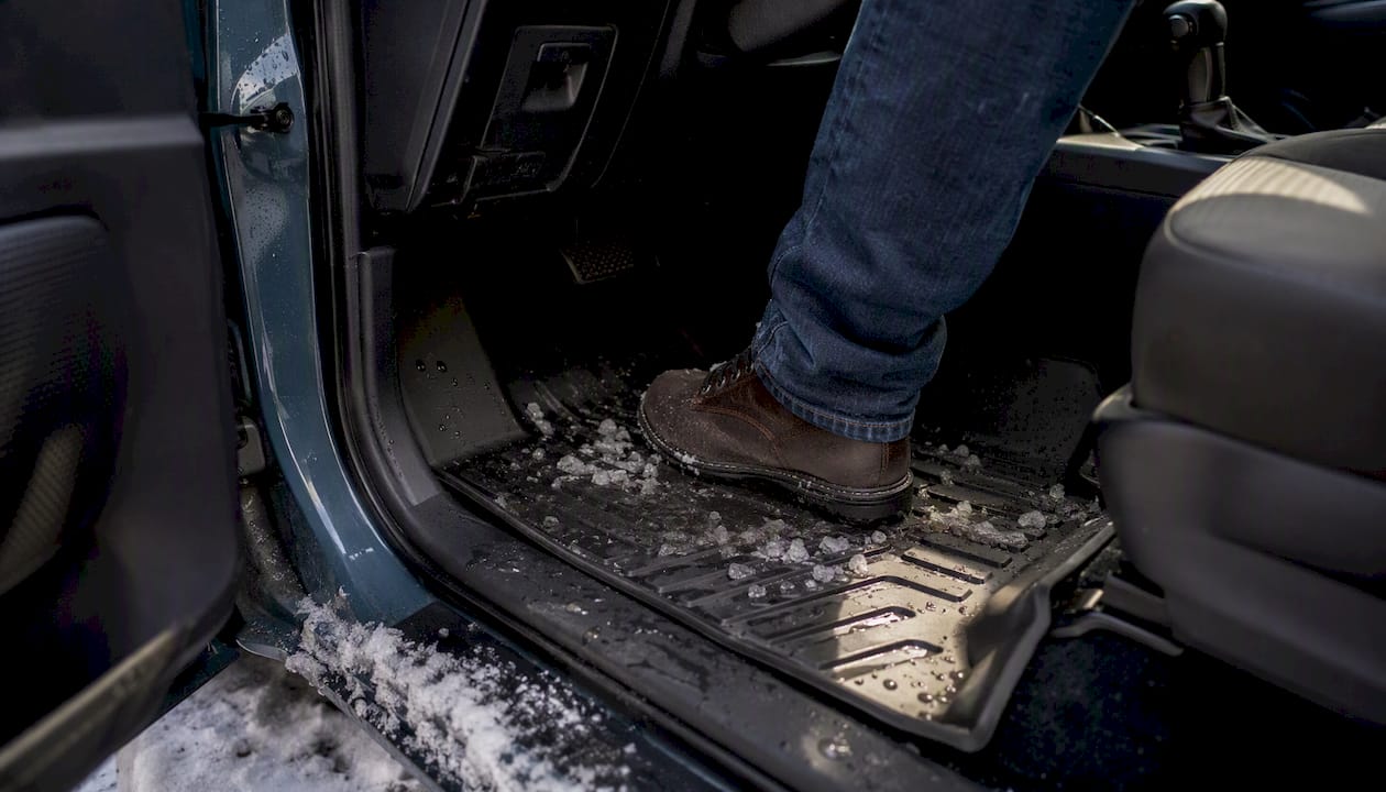 TPE floor mat containing snow inside truck