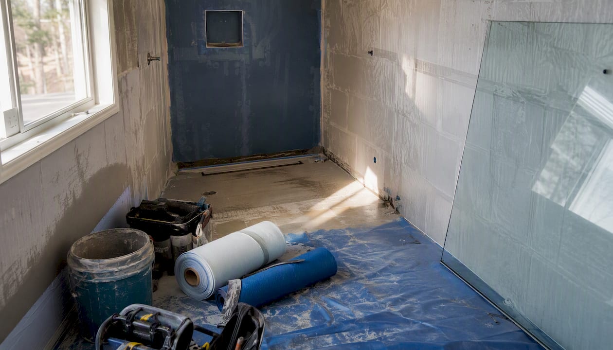 Mid-range curbless shower installation with linear drain