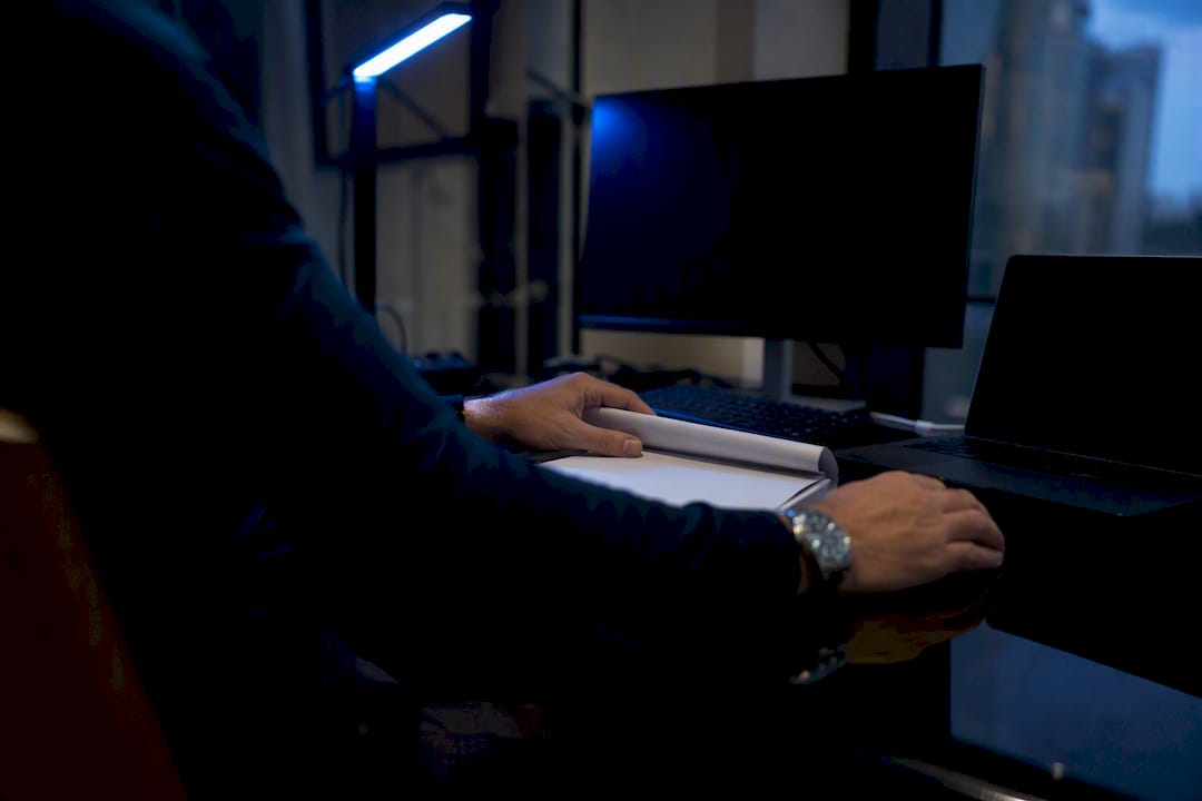 Trader's hands moving evaluation rules on desk