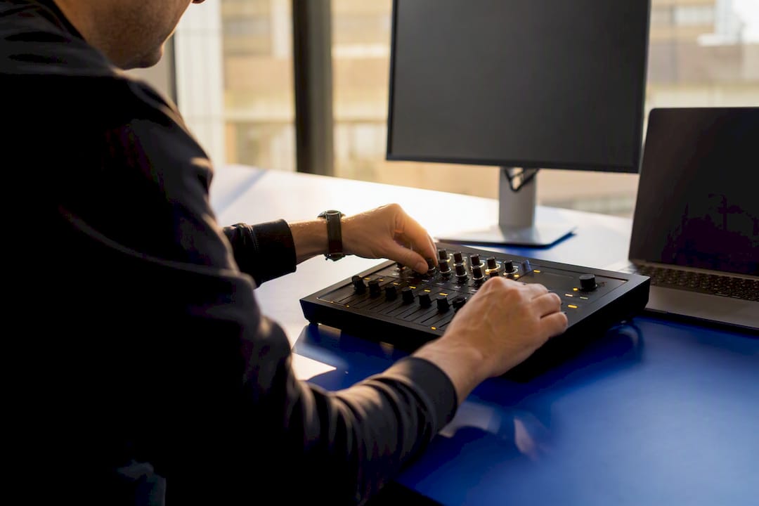 Hands adjusting budget pacing controls