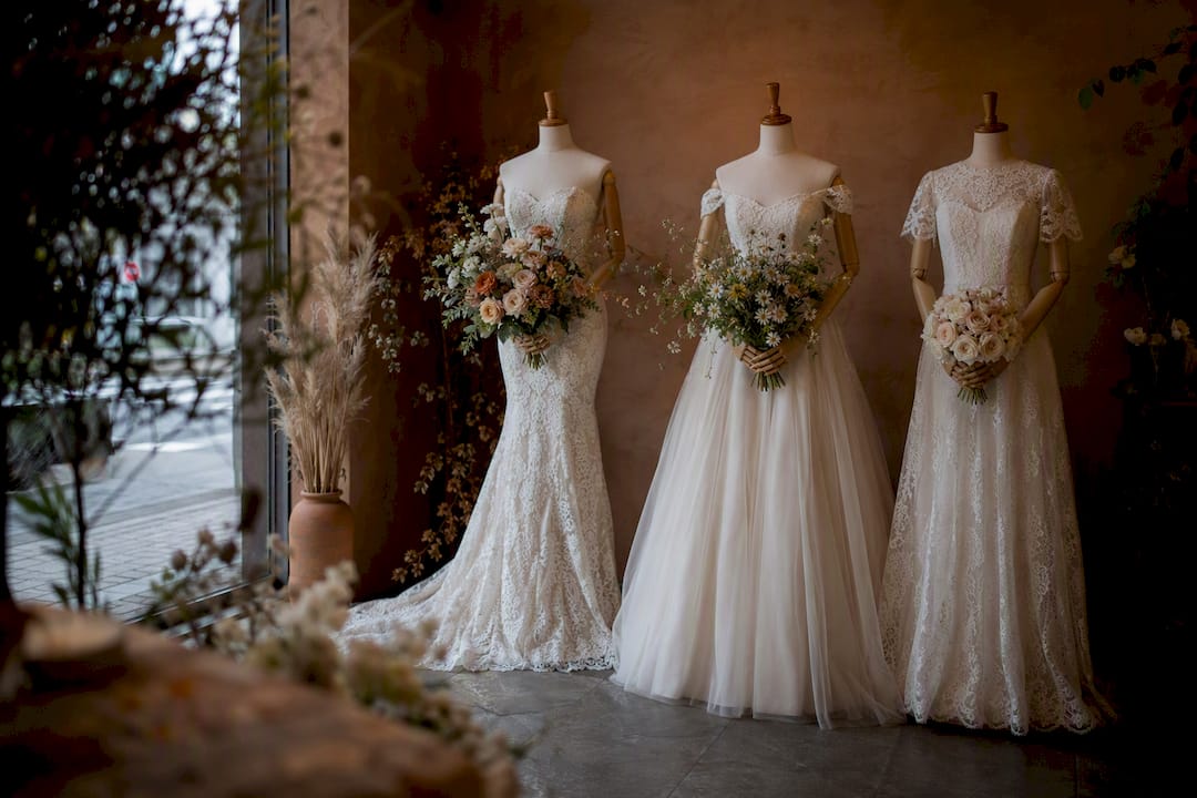 Wedding dresses paired with bouquet styles