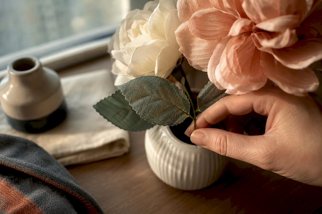 Close detail of silk petals beside a hospital bed