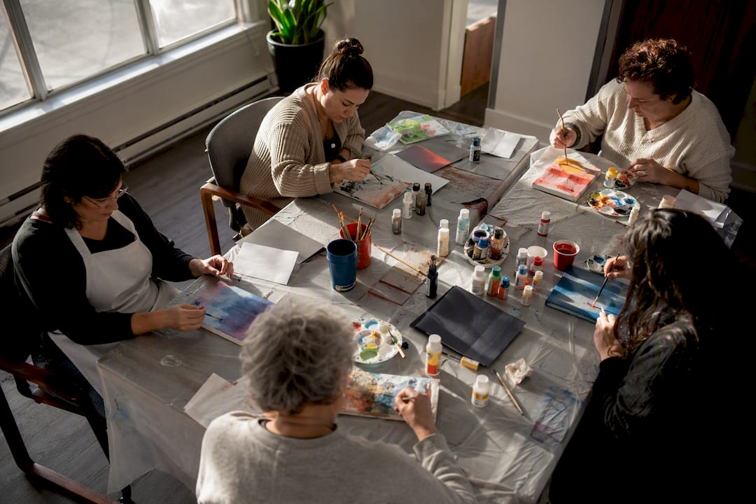 Caregivers crafting in support group