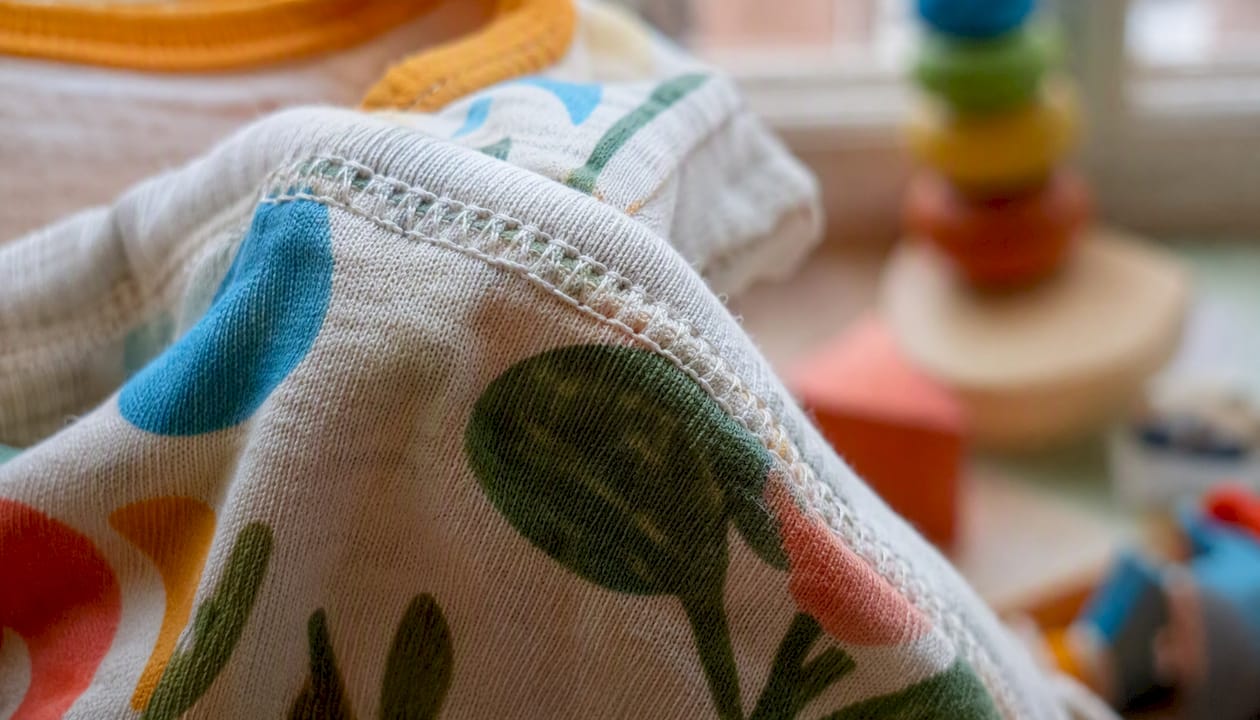 Close-up of stitched seam on kids organic cotton garment