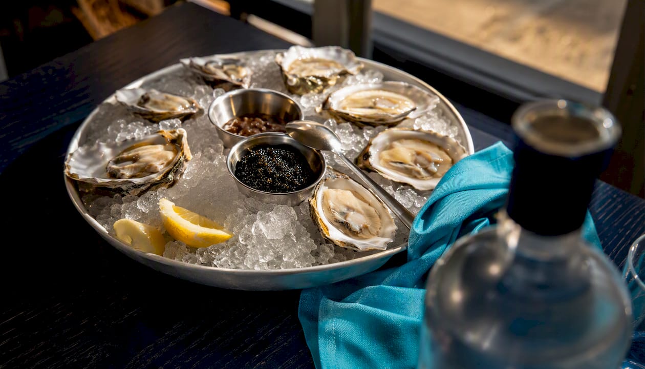 Caviar and oysters served on ice
