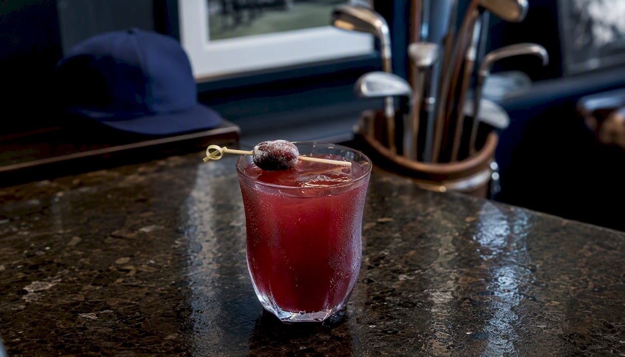 Transfusion cocktail with frozen grape garnish