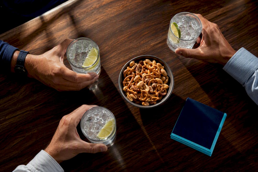 Clubhouse highballs and salty snacks