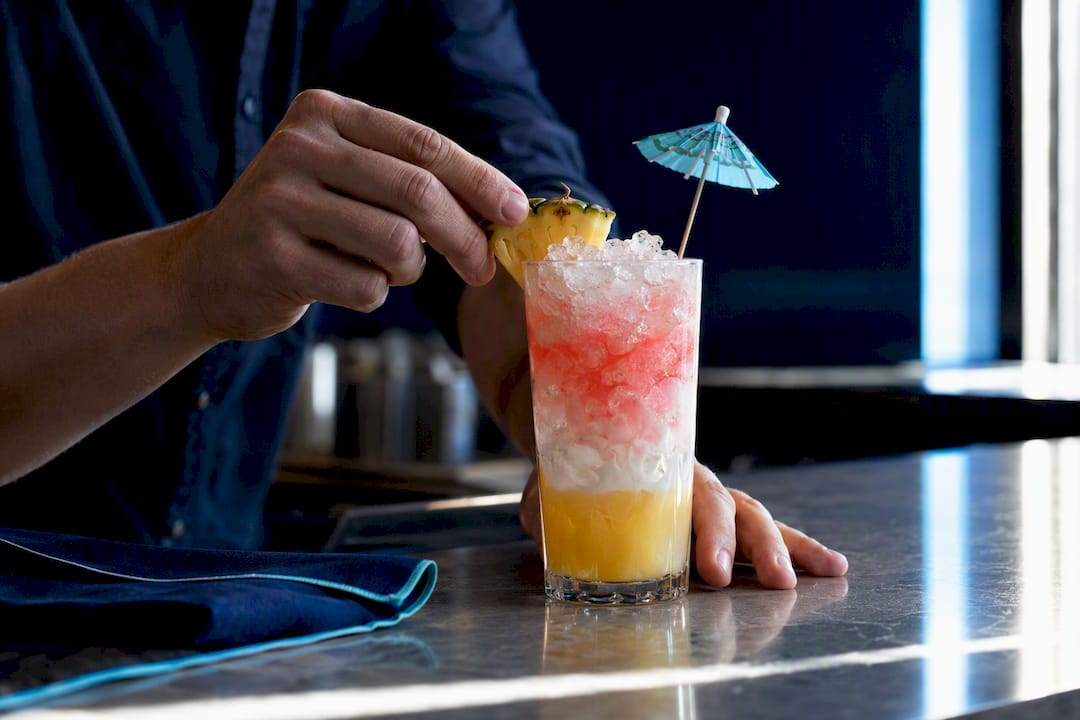 Pineapple coconut cocktail over crushed ice