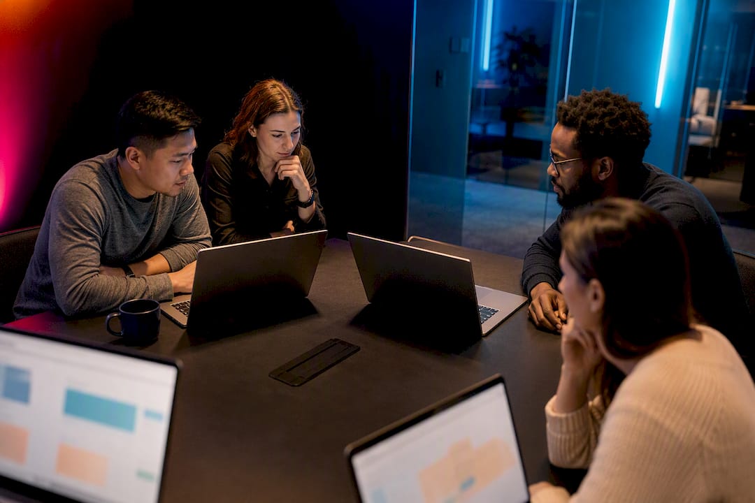 Team evaluating project management software