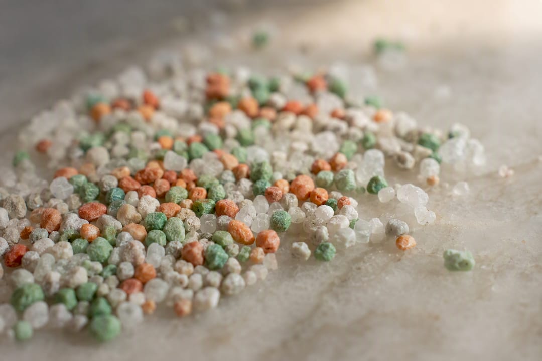 Close-up of color-changing litter granules