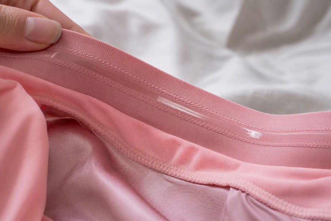 Silicone grip strip on underwear waistband inside