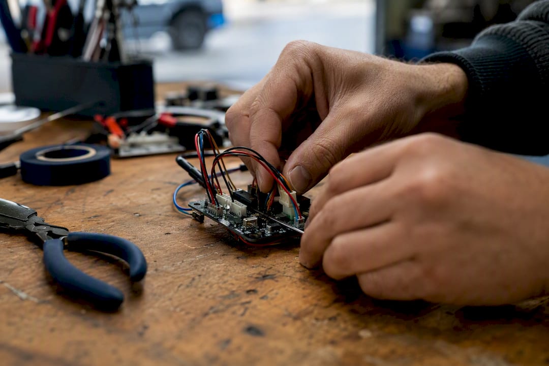 Hands wiring circuit board for collaboration example