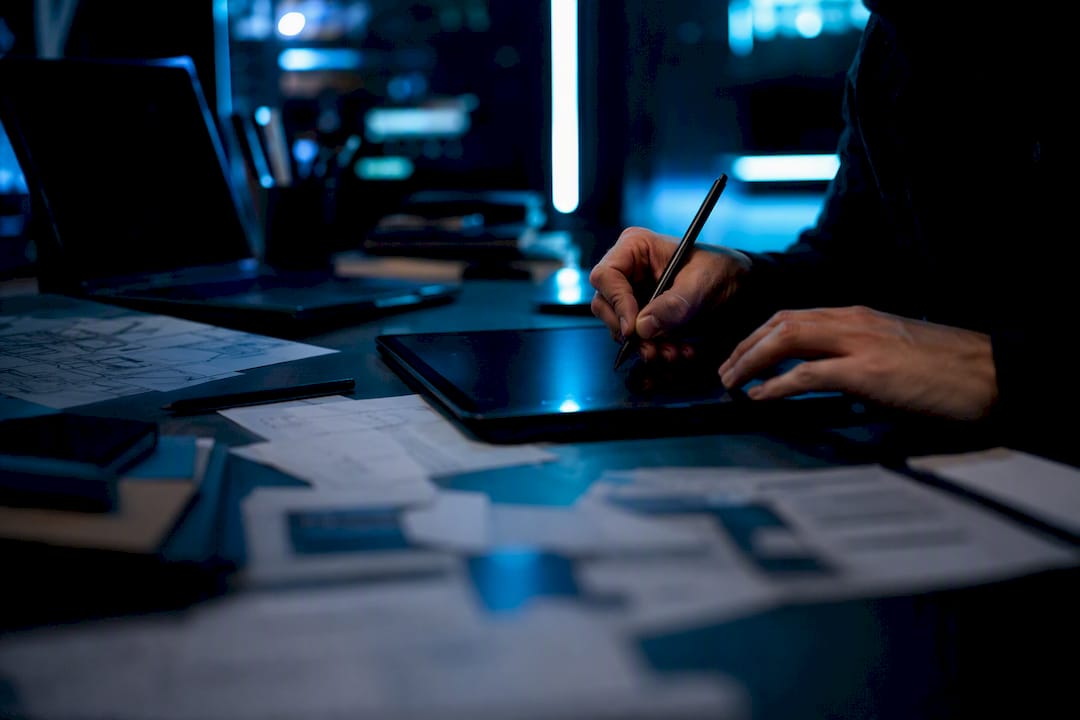 Hands summarizing AI memory notes in tech lab