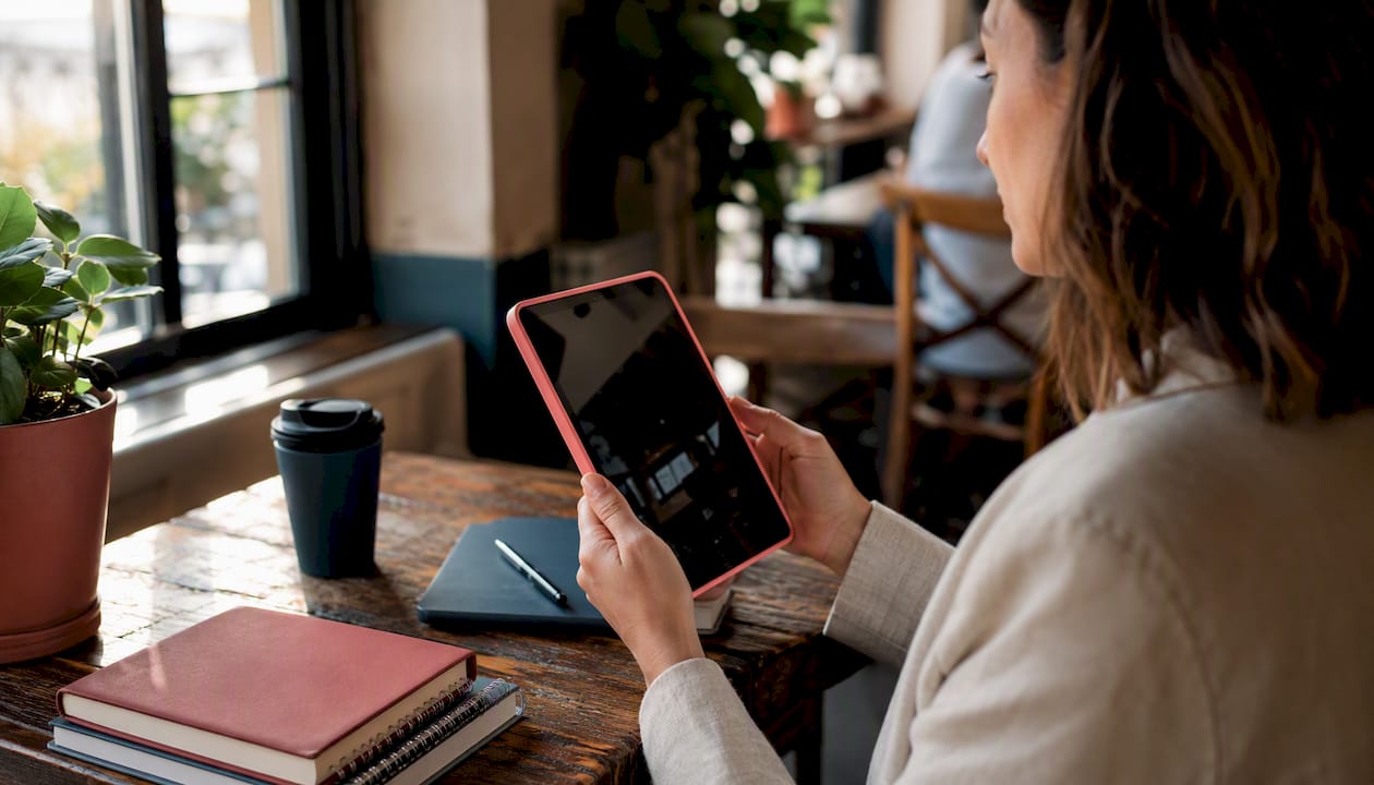 Person checking salary-listed social media jobs on tablet