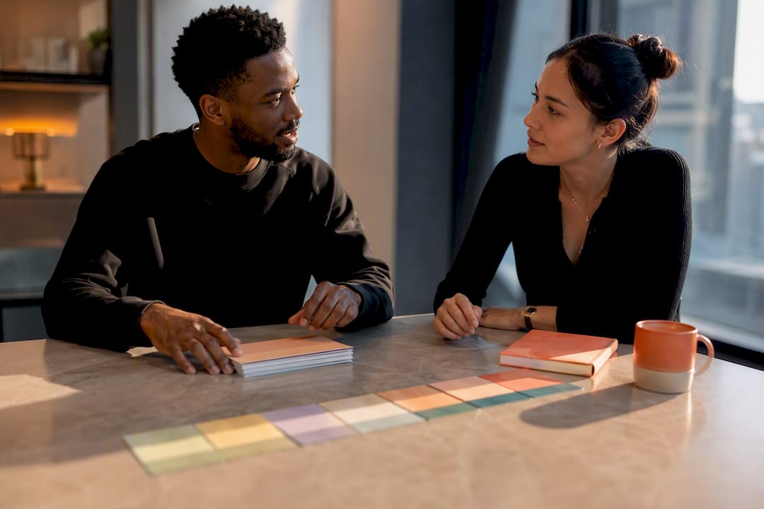 Marketer and creator reviewing partnership terms