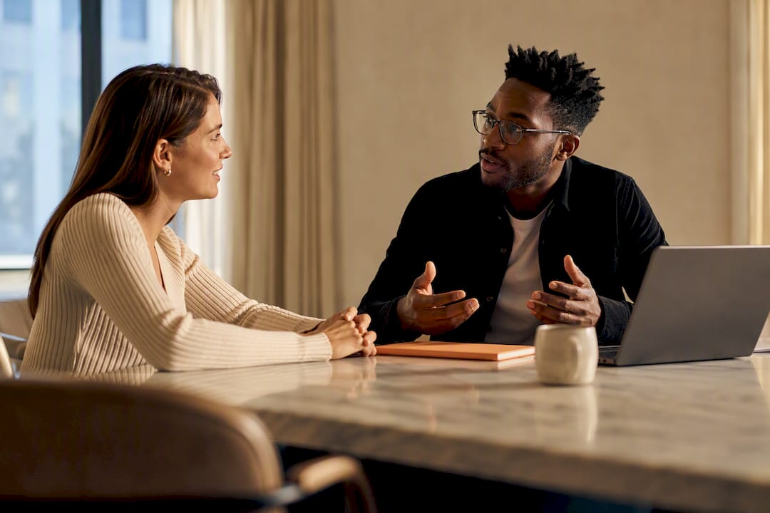 Brand and creator negotiating collaboration terms