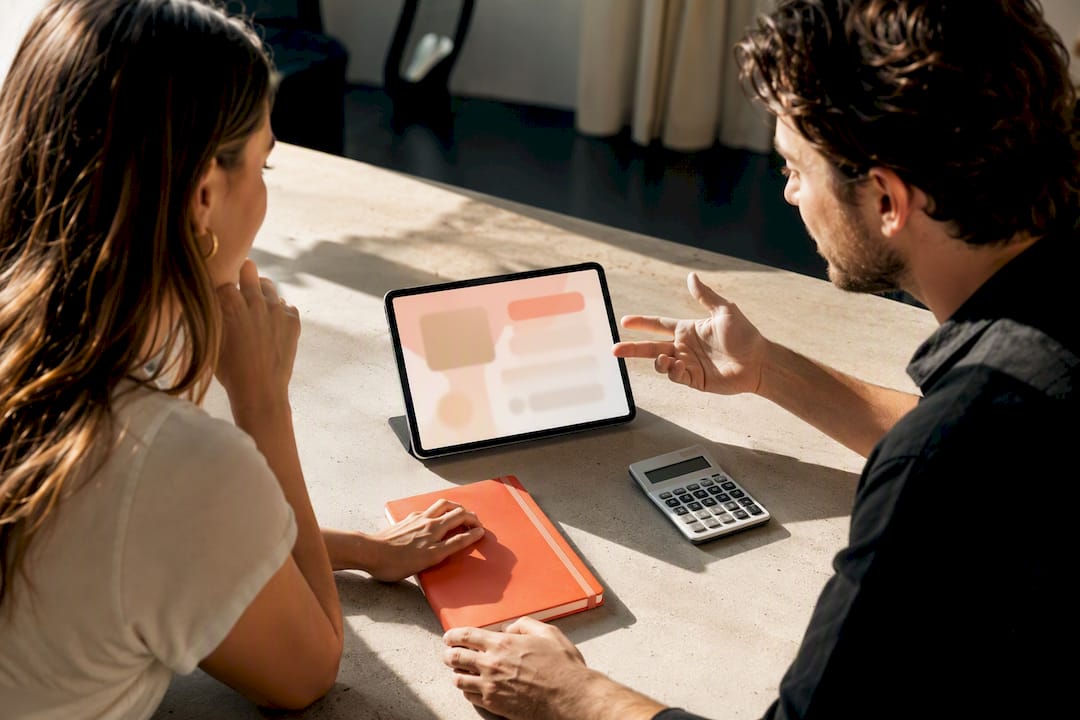 Creator and marketer reviewing sponsored post pricing