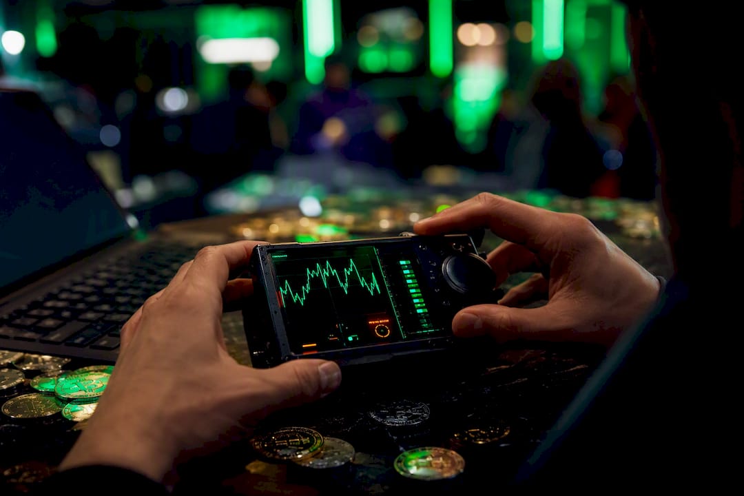 Hands adjusting crypto volatility meter device