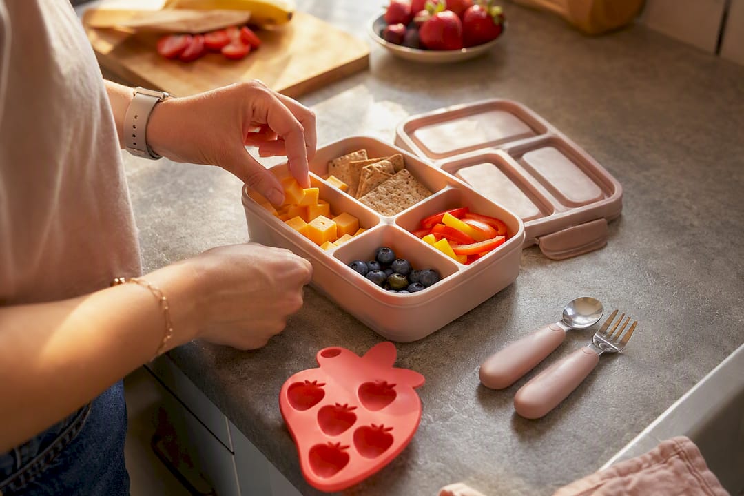 Packaged kids lunchbox with fresh fruit and protein