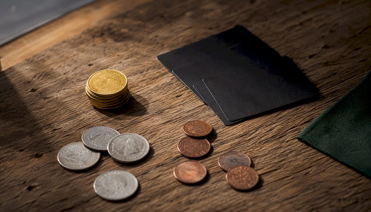 Coins and tokens representing commodities, REITs, and gold