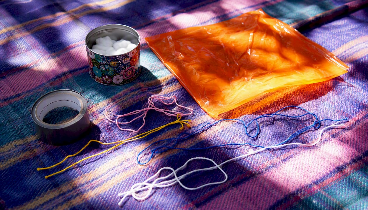 Materials for parachute egg drop device on table