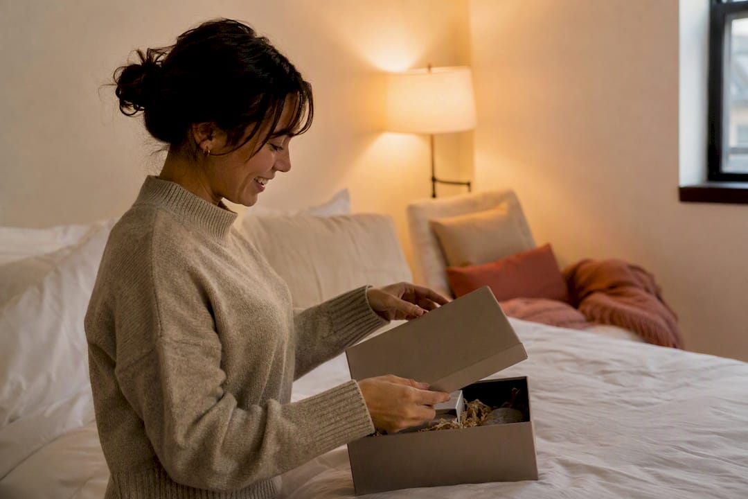 Woman receiving wrapped self care gift