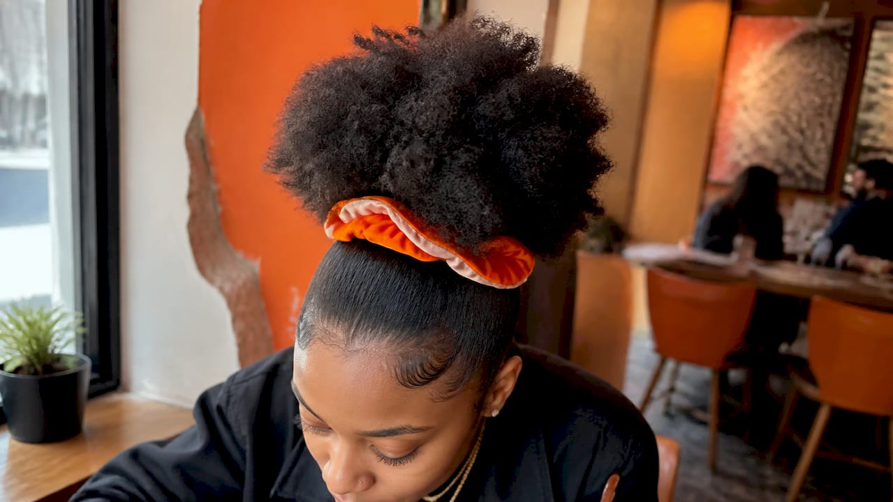 High puff hairstyle on 4B hair with edge control