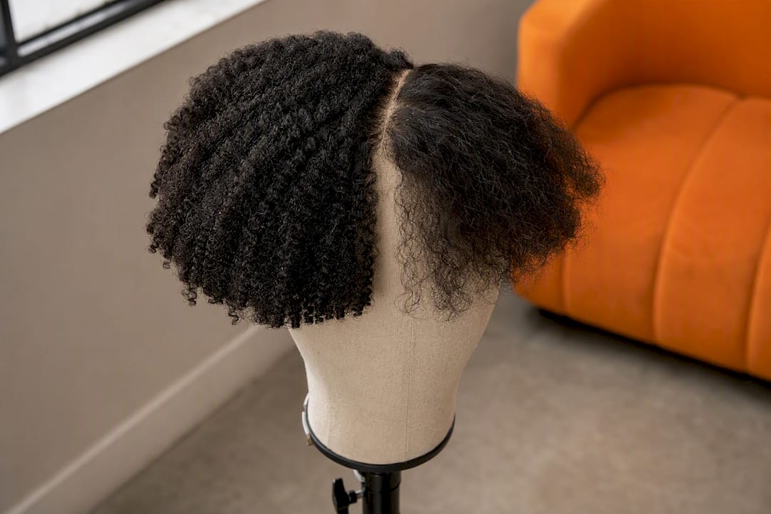Contrast of thick blunt and fine wispy curly bangs