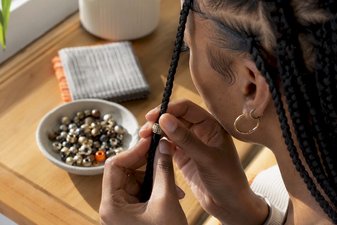 Bead attached to braid mid-shaft