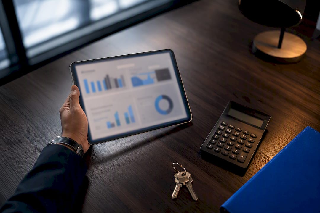 Property manager reviewing rental cash flow dashboard