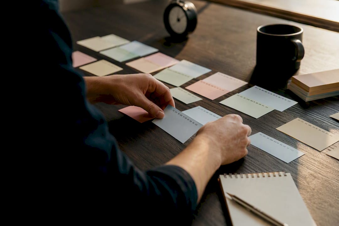 Hands adjusting caption timeline cards