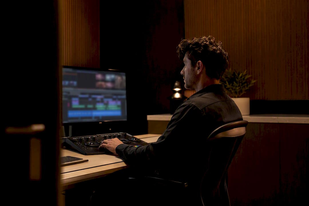 Freelance editor reviewing post-production project