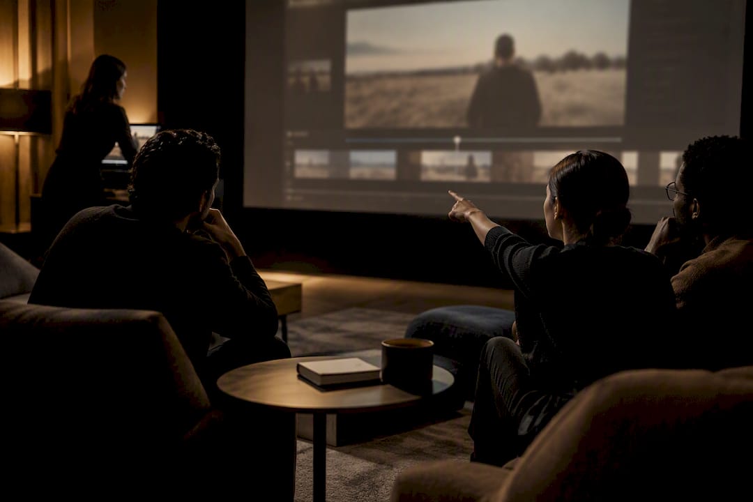 Creative team reviewing a video cut together