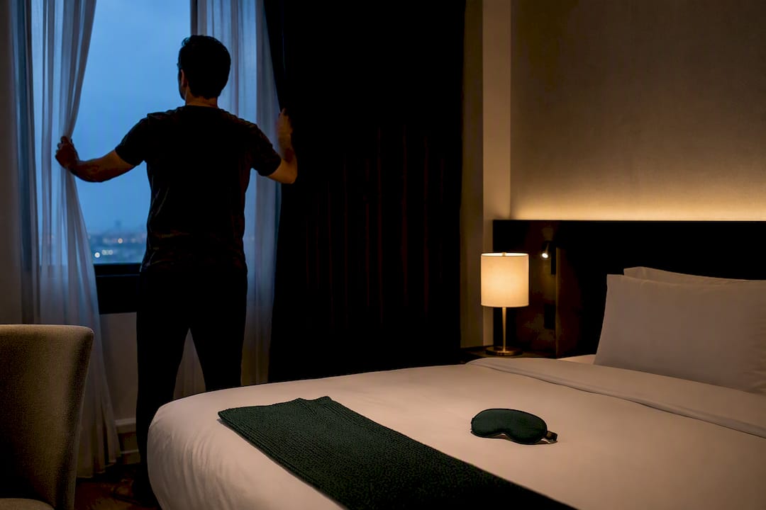 Hotel room prepared for restorative sleep