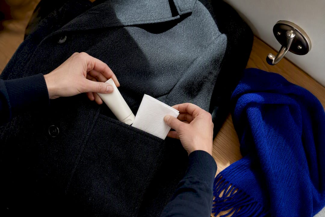 Winter coat pocket with static hair essentials