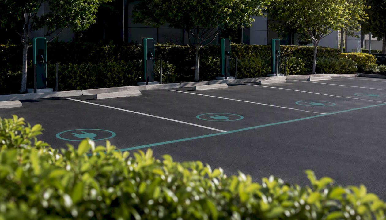 Designated EV charging bays in office parking lot